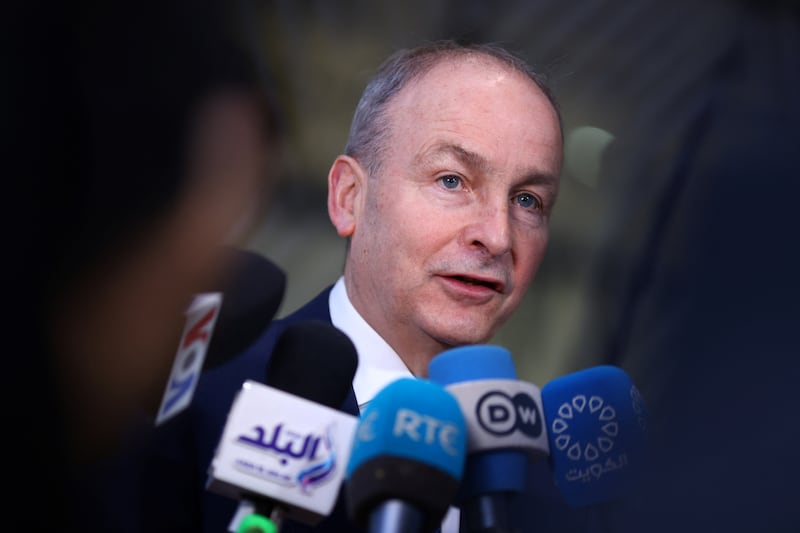 Irish Foreign Minister Micheal Martin. He has described the actions of Hamas and Israel as a breach of humanitarian law 'on a mass scale'. AFP