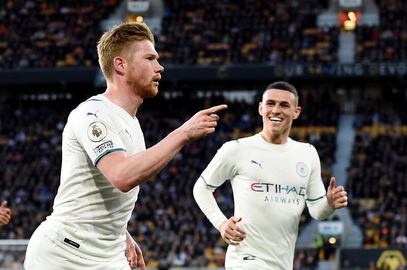 De Bruyne celebrates scoring City's third goal with Phil Foden. Reuters