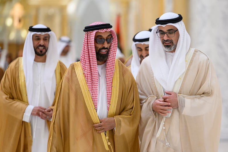 Sheikh Khaled bin Mohamed, Crown Prince of Abu Dhabi, and Sheikh Tahnoun bin Zayed, National Security Adviser and Deputy Ruler of Abu Dhabi, attend the reception. Abdulla Al Neyadi / UAE Presidential Court