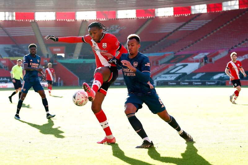 Southampton's Daniel N'Lundulu in action with Arsenal's Gabriel. Action Images