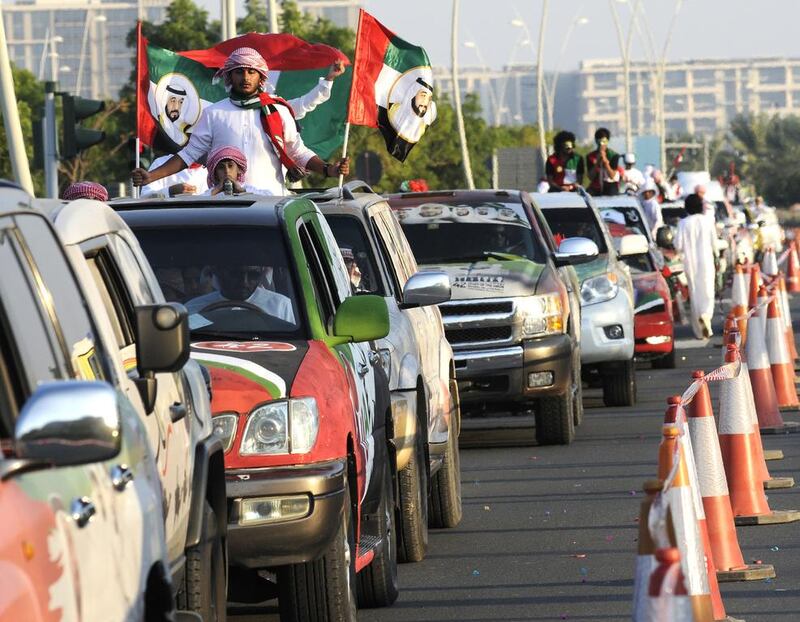 Cars and drivers take part of record breaking history as embellished cars descend on Yas Island to attempt a Guinness World Records title for the longest parade of decorated cars on the 42 National Day of the UAE. The event was organised by The Life & Style Show UAE on Monday, Dec. 02, 2013 in Abu Dhabi, United Arab Emirates. Photo: Charles Crowell for The National  