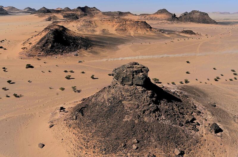 A driver competes in the Stage 8 of the Dakar Rally 2020 around Wadi Ad-Dawasir.  AFP