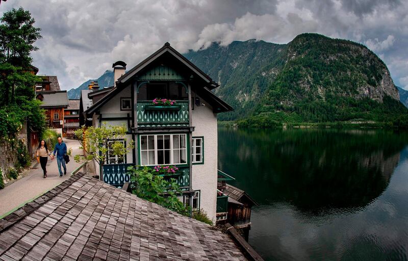 The Unesco-listed town on Lake Hallstatt's western shore in Austria's mountainous Salzkammergut region is eerily quiet now that tourism has halted. AFP