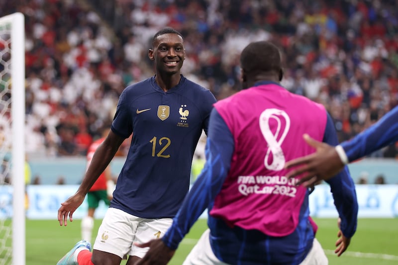 France substitute Randal Kolo Muani celebrates after scoring the second goal against Morocco. Getty