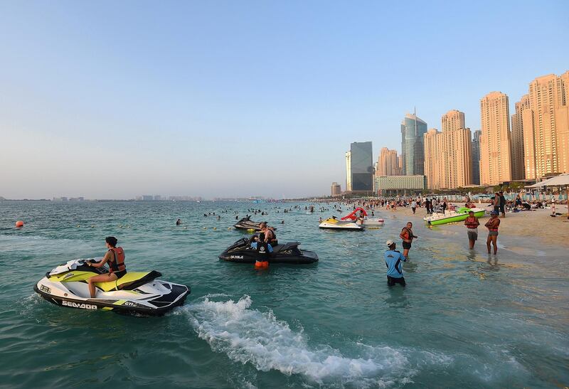 DUBAI, UNITED ARAB EMIRATES - SEPTEMBER 11: Locals and expats join holiday makers as they relax on the beach ahead of  Eid Al-Adha at Jumeirah Beach Residence on September 11, 2016 in Dubai, United Arab Emirates. Muslims across the world are preparing to celebrate Eid Al-Adha, or the Festival of Sacrifice, which marks the end of the Hajj pilgrimage to Mecca which thousands of Muslims all over the world embark on.  (Photo by Tom Dulat/Getty Images)