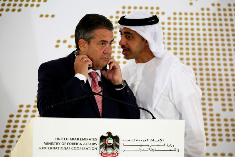Sheikh Abdullah bin Zayed and Sigmar Gabriel spoke about the challenges the Middle East faces as they met in Abu Dhabi on Wednesday. Jon Gambrell / AP