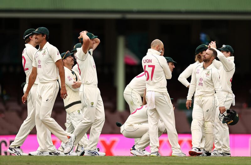 Australia players are stunned after after a DRS referral against India batsman Ajinkya Rahane was turned down. Getty