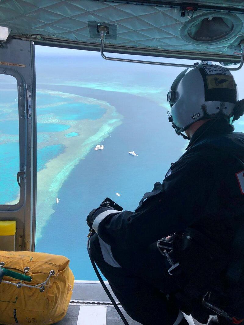 Paramedics rescue a man after a shark attack near the Great Barrier Reef in Australia. RACQ CQ Rescue Twitter