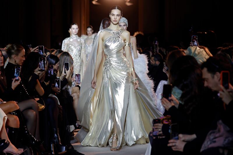 Molten silver looks at the Zuhair Murad Haute Couture spring 2023 show in Paris. Getty Images