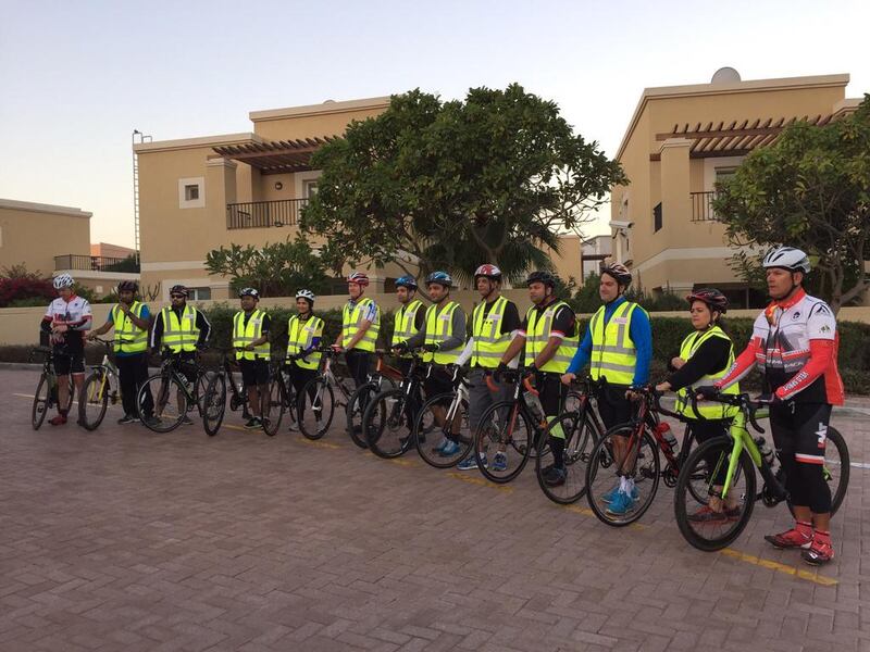 RAK Bank employees line up before setting off to take part in The Nationals Cycle to Work day at Silicon Oasis in Dubai. Pawan Singh / The National.