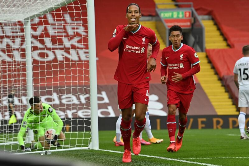 Liverpool's Virgil van Dijk celebrates after he scored his side's second goal. AP