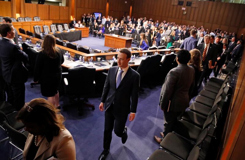 Facebook CEO Mark Zuckerberg departs after the hearing. Alex Brandon. AP Photo