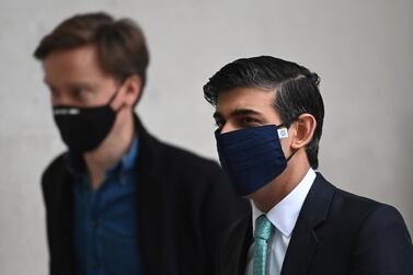 Rishi Sunak arrives at a television studio on Sunday. Britain's finance minister is expected to freeze income tax thresholds of £12,5000 and £50,000 tax for at least three years. Reuters