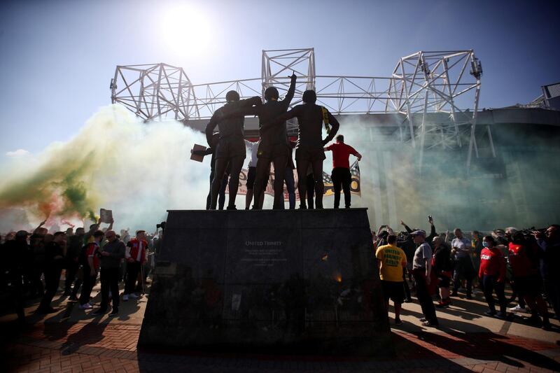 Manchester United fans protest against the club's owners at Old Trafford on Saturday, April 24, after the failed launch of a European Super League. Reuters