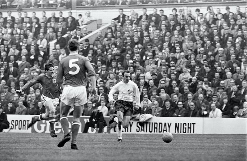 FA Cup Semi Final match at Hillsborough. Tottenham Hotspur 2 v Nottingham Forest 1. Jimmy Greaves shows a clean pair of heels to Forest right-back Peter Hindley during the FA Cup semi-final at Hillsborough. The Spurs maestro opened the scoring with an opportunistic left-foot daisy-cutter from 25 yards after half an hour in which the north Londoners had been decidedly second-best to Johnny ' team, 29th April 1967. (Photo by Ernest Chapman and John Varley/Mirrorpix/Getty Images)