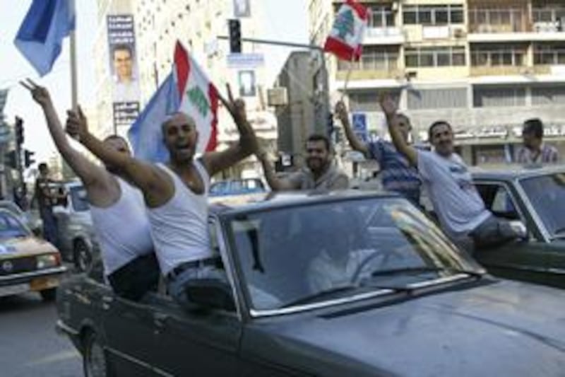 Lebanese supporters of Sunni Muslim politician Saad al Hariri, leader of the anti-Syrian alliance, celebrate in Tripoli June 8, 2009.