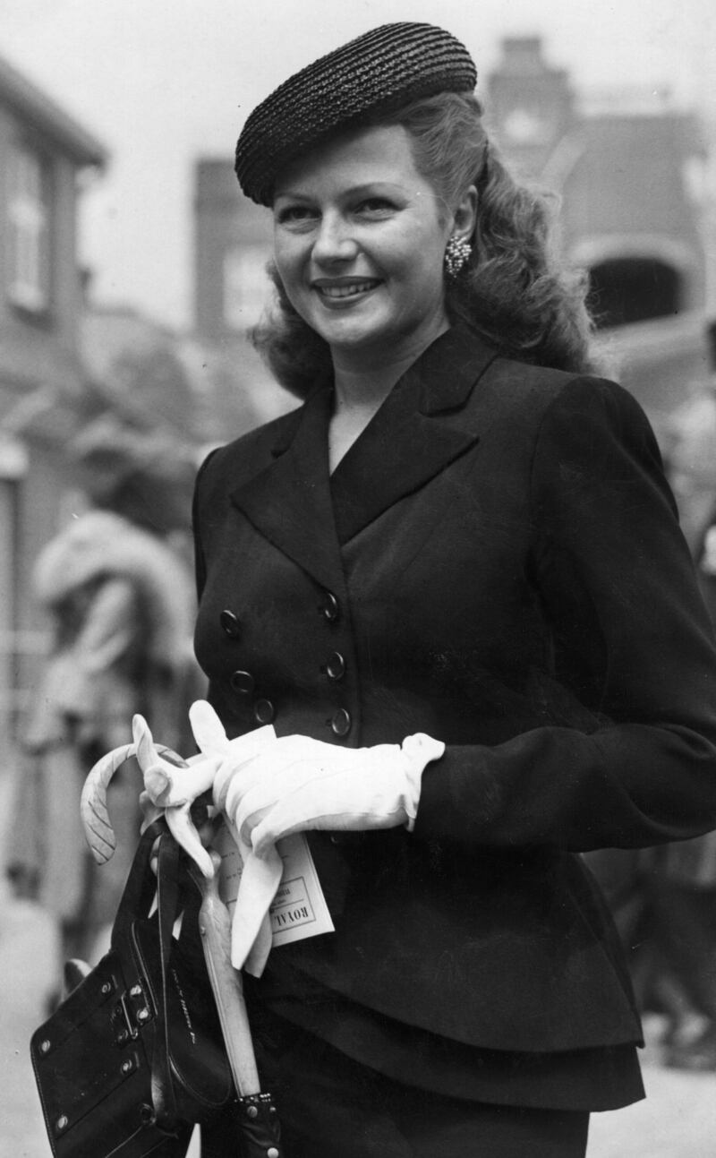 US actress Rita Hayworth arriving at Ascot on June 13, 1950. Getty Images