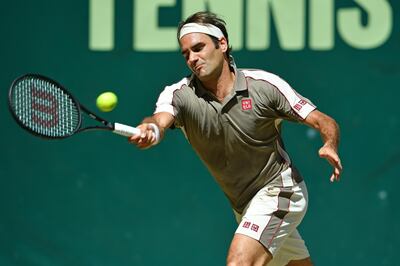 HALLE, GERMANY - JUNE 23: Roger Federer of Switzerland plays a backhand in the final match against David Goffin of Belgium during day 7 of the Noventi Open at Gerry Weber Stadium on June 23, 2019 in Halle, Germany. (Photo by Thomas F. Starke/Getty Images)