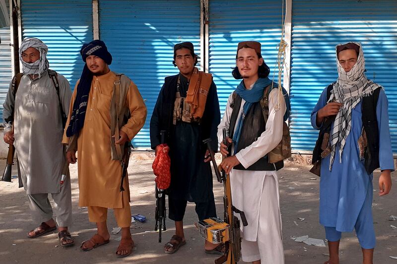 Taliban fighters stand guard in Kunduz city, northern Afghanistan. The militants have ramped up their push across much of the country in recent weeks.
