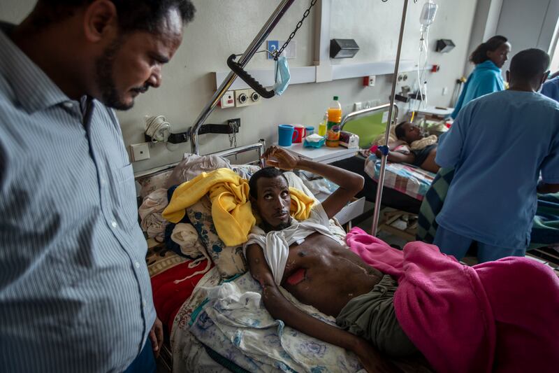 A civilian who said he was shot by Eritrean forces during their advance into Ethiopia recovers in a hospital in Tigray. AP