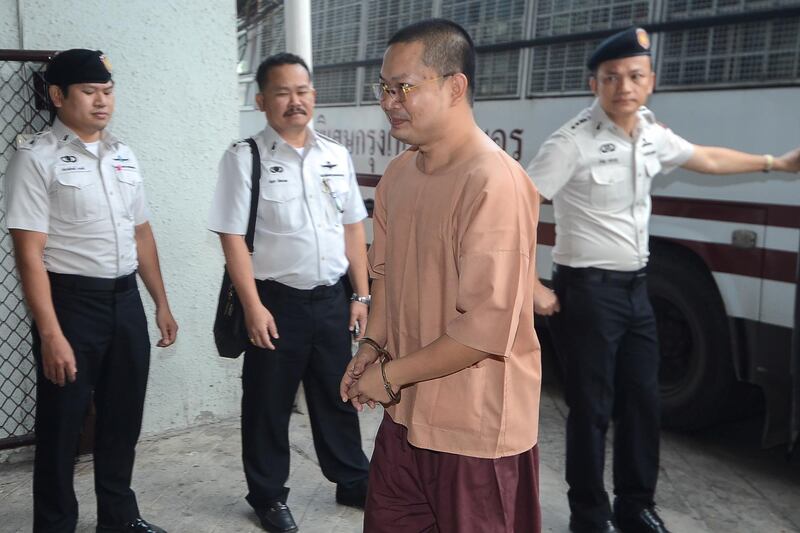 Wirapol Sukphol, former Thai Buddhist monk who provoked outrage with his lavish lifestyle arrives at the Criminal court in Bangkok, Thailand, August 9, 2018. Dailynews/ via REUTERS ATTENTION EDITORS - THIS IMAGE WAS PROVIDED BY A THIRD PARTY. NO RESALES. NO ARCHIVE. THAILAND OUT.