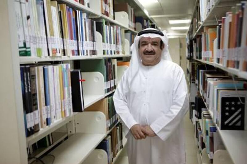 March 19, 2012 (Abu Dhabi) Abdul Razak Al Khumairi is a librarian at the Arabian Gulf library goes through the stacks at the recently opened library March 19, 2012.  (Sammy Dallal / The National)