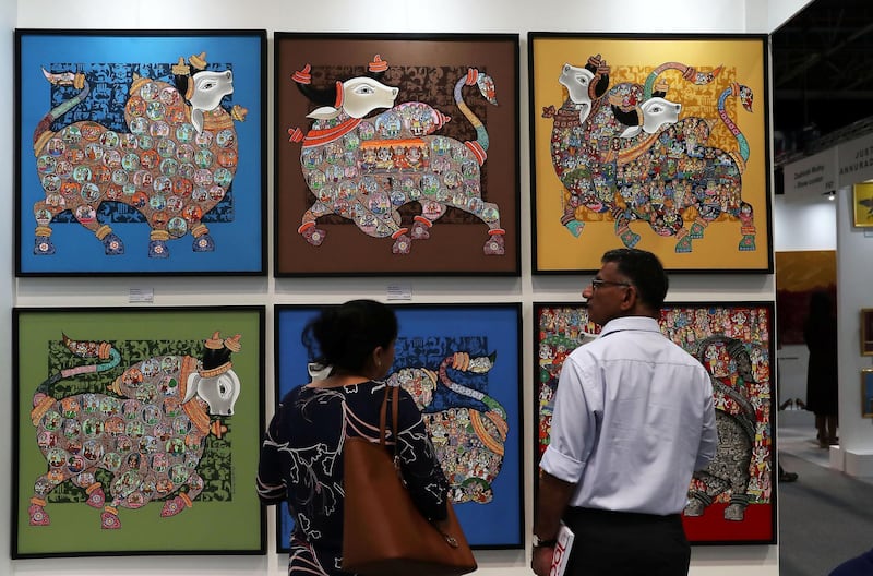 DUBAI , UNITED ARAB EMIRATES , April 3 – 2019 :-  Visitors looking at the art works which are on display at the World Art Dubai 2019 held at Dubai World Trade Centre from 3rd to 6th April in Dubai. ( Pawan Singh / The National ) For News/Online/Instagram