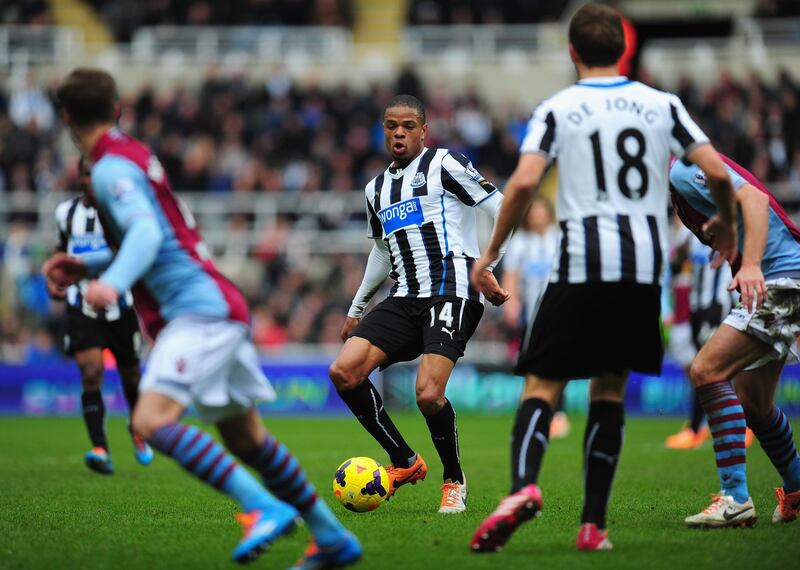 NEWCASTLE UPON TYNE, ENGLAND - FEBRUARY 23:  Newcastle player Loic Remy (c) in action during the Barclays Premier League match between Newcastle United and  Aston Villa at St James' Park on February 23, 2014 in Newcastle upon Tyne, England.  (Photo by Stu Forster/Getty Images)