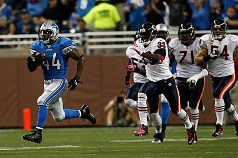 Jahvid Best, left, beats the Chicago Bears cover, to rush to an 88-yard touchdown which helped Detroit Lions to a 24-13 win.