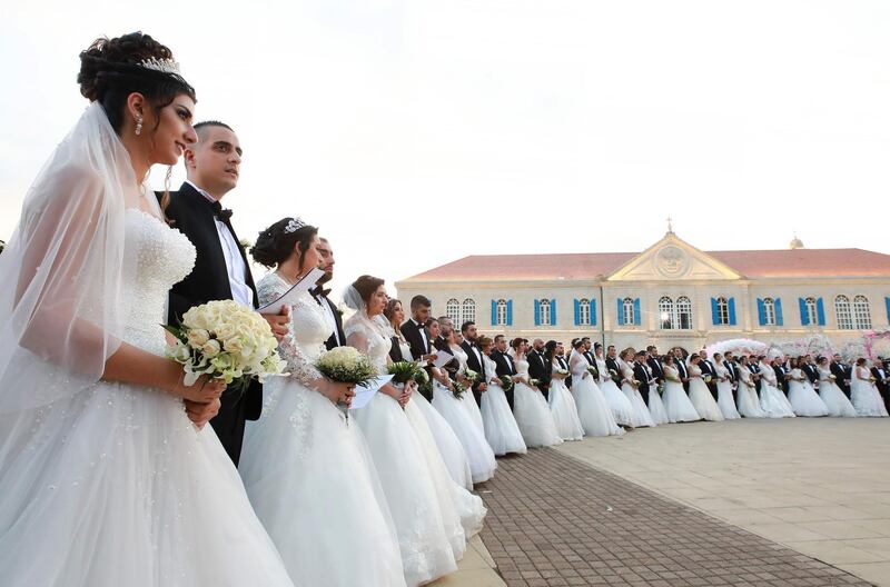Forty-one Lebanese Maronite Christian couples take part in a mass wedding at the Maronite Patriarchate in Bkerke. AFP