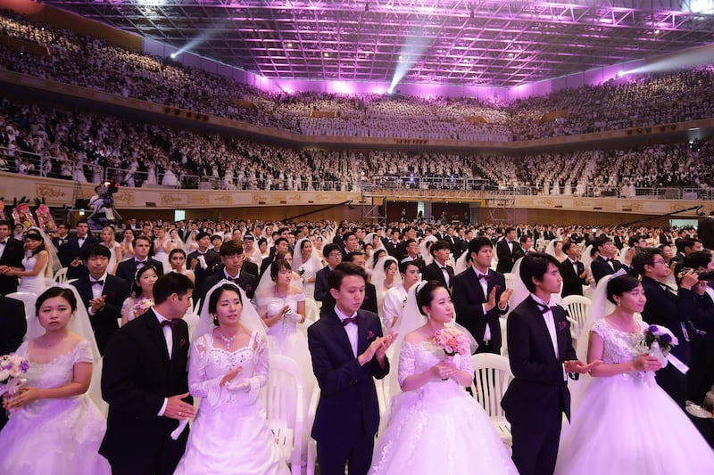 Some 4,000 'Moonies', believers of Unification Church, which was named after the founder Moon Sun-myung, attend the mass wedding which began in the early 1960s.  Chung Sung-Jun / Getty Images