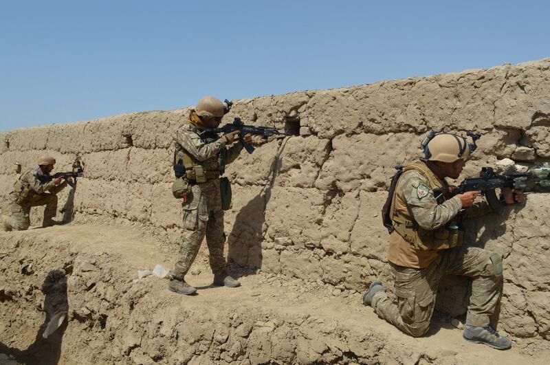 Afghan security forces take position during a battle with the Taliban in Kunduz province, Afghanistan September 1, 2019. REUTERS/Stringer   NO RESALES. NO ARCHIVES