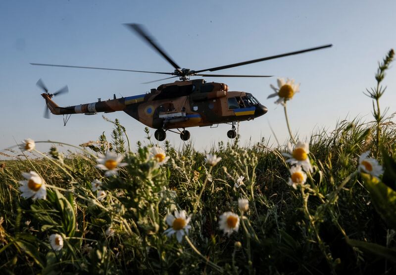 A helicopter takes off to carry out a mission during military drills in the north of Ukriane. Reuters