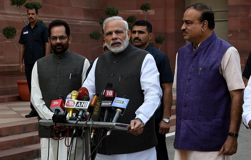 Indian prime minister Narendra Modi addresses the media after arriving for the winter session of Parliament in New Delhi. Money Sharma / AFP Photo