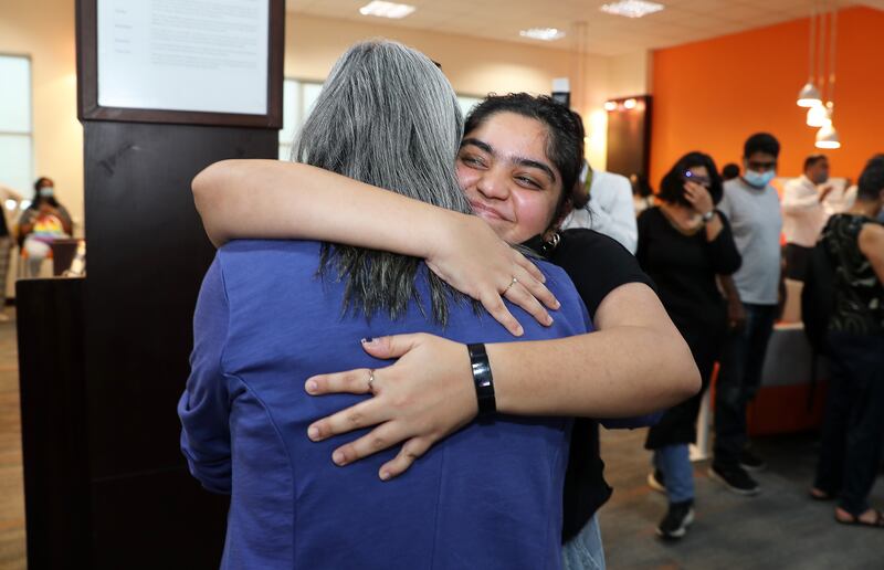 Drishtee Johar gets a hug from principal Ms Nargish Khambatta at Gems Modern Academy.