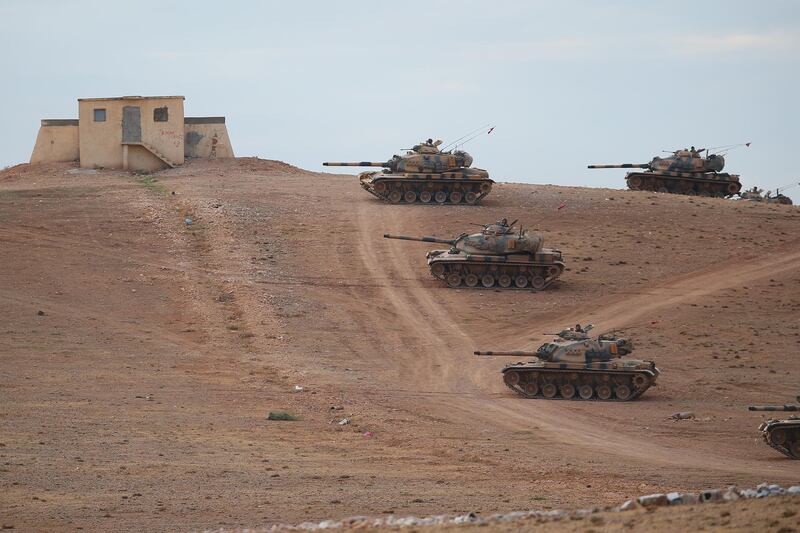 SANLIURFA, TURKEY - SEPTEMBER 29:  (TURKEY OUT) Turkish Armed Forces dispatch tanks to the Turkish - Syrian border as clashes intensified with Islamic State of Iraq and Levant (ISIL) militants on September 29, 2014 in Suruc district of Sanliurfa, southeastern province of Turkey. Islamic State (IS, also called ISIS and ISIL) fighters are reportedly advancing with heavy weaponry on the strategic Kurdish border town of Kobani (also called Ayn Al-Arab). Several hundred thousand refugees are reportedly in Kobani and aid agencies are bracing for a massive exodus into Turkey. (Photo by Getty Images)