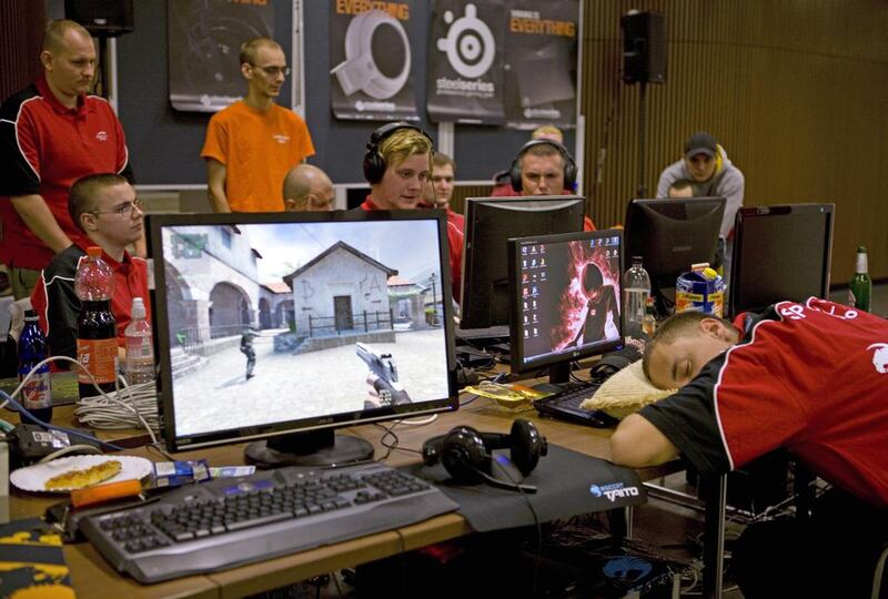 Gamers at a Lan (Local area network) party in Berlin play Counter-Strike, one of the games chosen for the Game Evolution tournament this November at Dubai World Trade Centre. Caroline Pankert / AFP