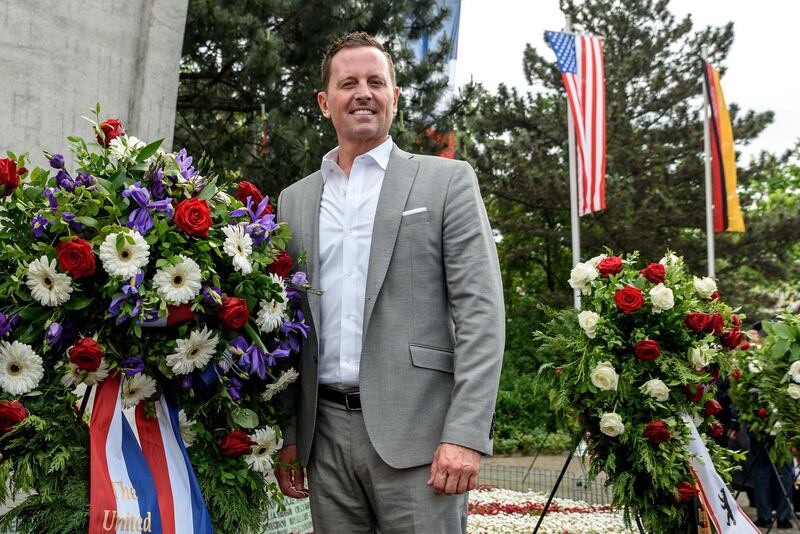 FILE PHOTO: U.S. ambassador to Germany Richard Allen Grenell stands beside a wreath in Berlin, Germany, May 12, 2018.REUTERS/Stringer  NO RESALES. NO ARCHIVES