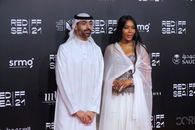 Red Sea International Film Festival chairman Mohammed Al Turki poses with British model Naomi Campbell during the closing ceremony in 2021. AP