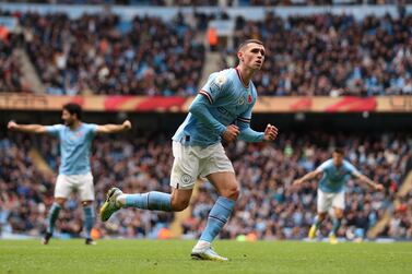 MANCHESTER, ENGLAND - NOVEMBER 12: Phil Foden of Manchester City celebrates after scoring their team's first goal during the Premier League match between Manchester City and Brentford FC at Etihad Stadium on November 12, 2022 in Manchester, England. (Photo by Charlotte Tattersall / Getty Images)