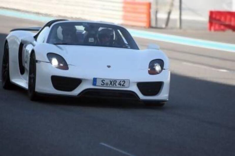 Taking a spin in the new Porsche 918 Spider which was at Yas Island's F1 race track in Abu Dhabi as part of its Middle East tour. Sammy Dallal / The National