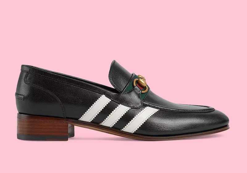 A classic Gucci loafer is given adidas' trademark three stripes. 