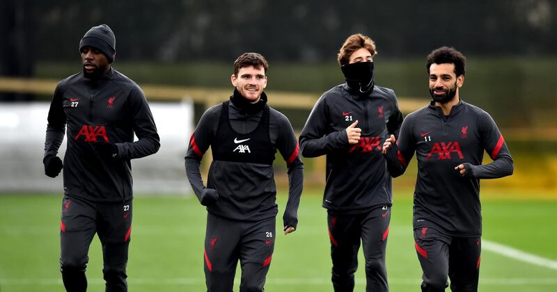 KIRKBY, ENGLAND - NOVEMBER 26: (THE SUN OUT, THE SUN ON SUNDAY OUT) Divock Origi, Andy Robertson, Kostas Tsimikas and Mohamed Salah of Liverpool during a training session at AXA Training Centre on November 26, 2020 in Kirkby, England. (Photo by Andrew Powell/Liverpool FC via Getty Images)