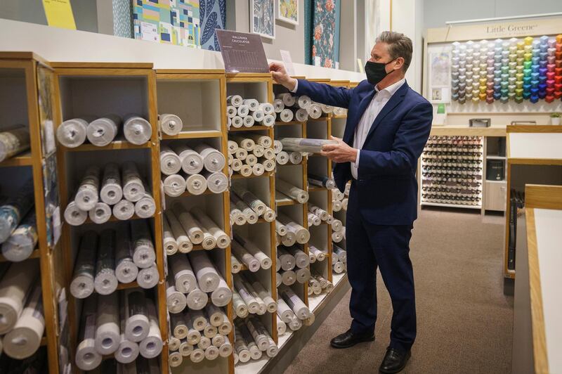 MANCHESTER, ENGLAND - APRIL 29: Labour Party leader Sir Keir Starmer browses through the wallpaper section at John Lewis & Partners department store at the Intu Trafford Centre on April 29, 2021 in Manchester, England. The Labour Leader is in the area to campaign in the Greater Manchester Mayoral and local elections.  (Photo by Christopher Furlong/Getty Images)