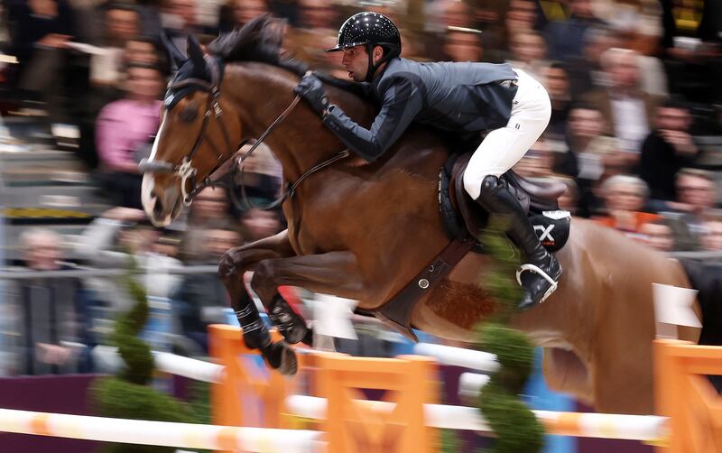 France's Julien Anquetin riding Blood Diamond du Pont on their way to winning the Grand Prix Hermes showjumping at the Grand Palais Ephemere in Paris. AFP