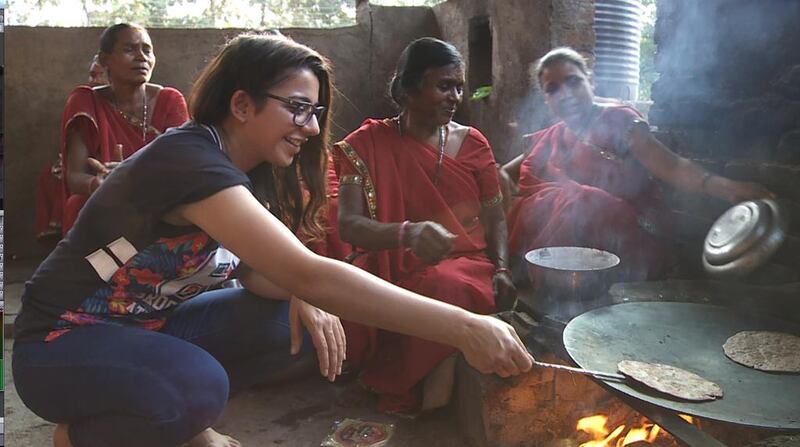 Singer Jasmine Sandlas tries cooking at a female-run dhaba, in Angels of Rock. Courtesy MTV India. 