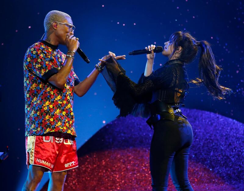 Pharrell Williams and Camila Cabello perform. Reuters