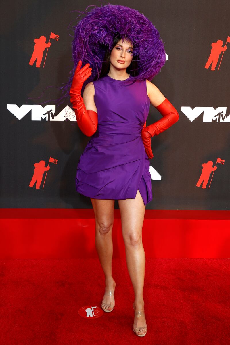 US singer Kacey Lee Musgraves, in Valentino, arrives on the MTV Video Music Awards red carpet.