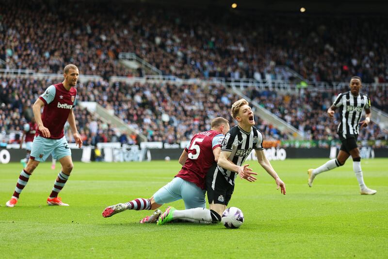 Vladimir Coufal of West Ham tangles with Newcastle's Anthony Gordon in the box to concede a penalty. Getty Images