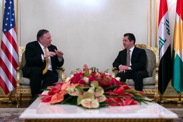 US Secretary of State Mike Pompeo, left, meets with Masrour Barzani, who was on Tuesday appointed prime minister of Iraq's autonomous Kurdistan Regional Government, in the province's capital Erbil in January 2019. AP